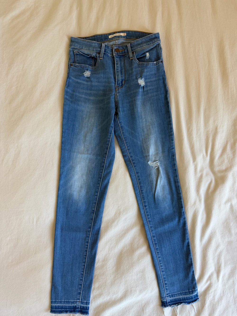 Levi's High-Rise Distressed Skinny Jeans in Blue